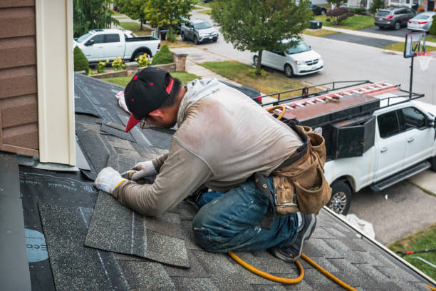 Professional Gutter Repair And Installation technician working in Compton, MD